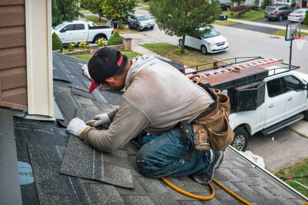 Professional Roofing technician working in Derry, NH